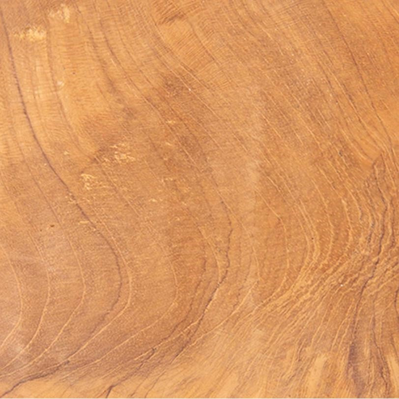 Close-up of a wooden surface with distinct natural grain patterns.
