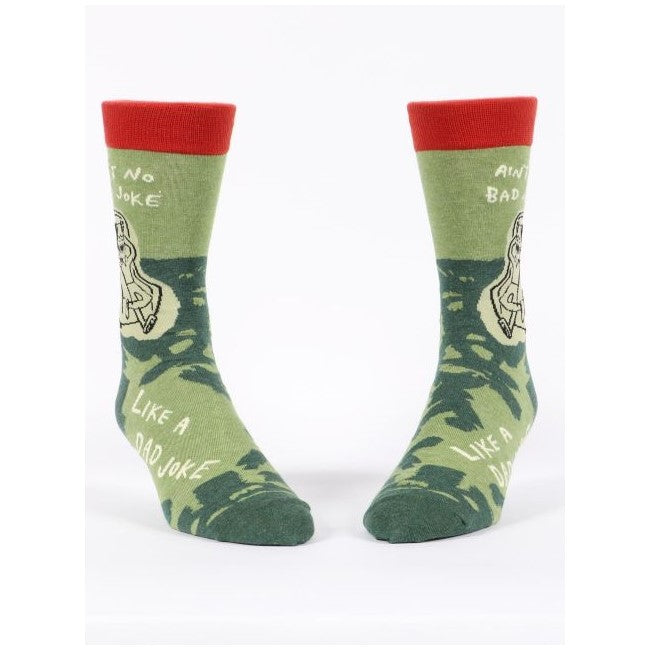 Green socks with red tops, text and a bicycle illustration.
