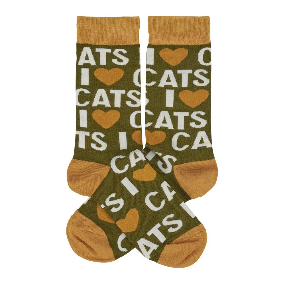 Green socks with "I ?? CATS" pattern.
