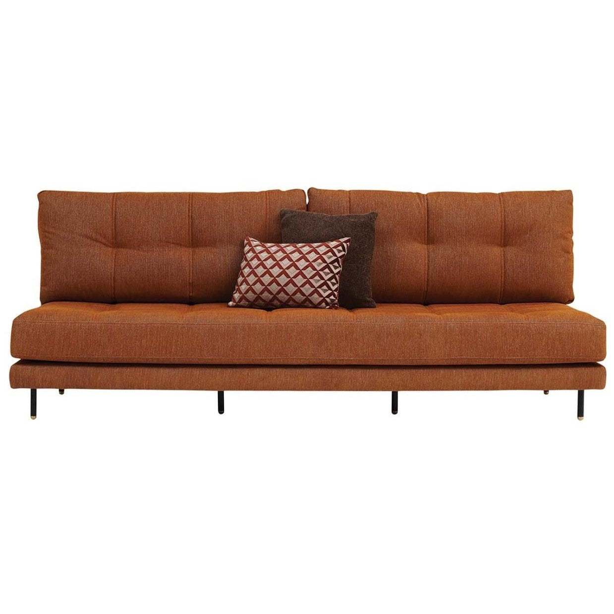 Orange sofa with two patterned accent pillows.