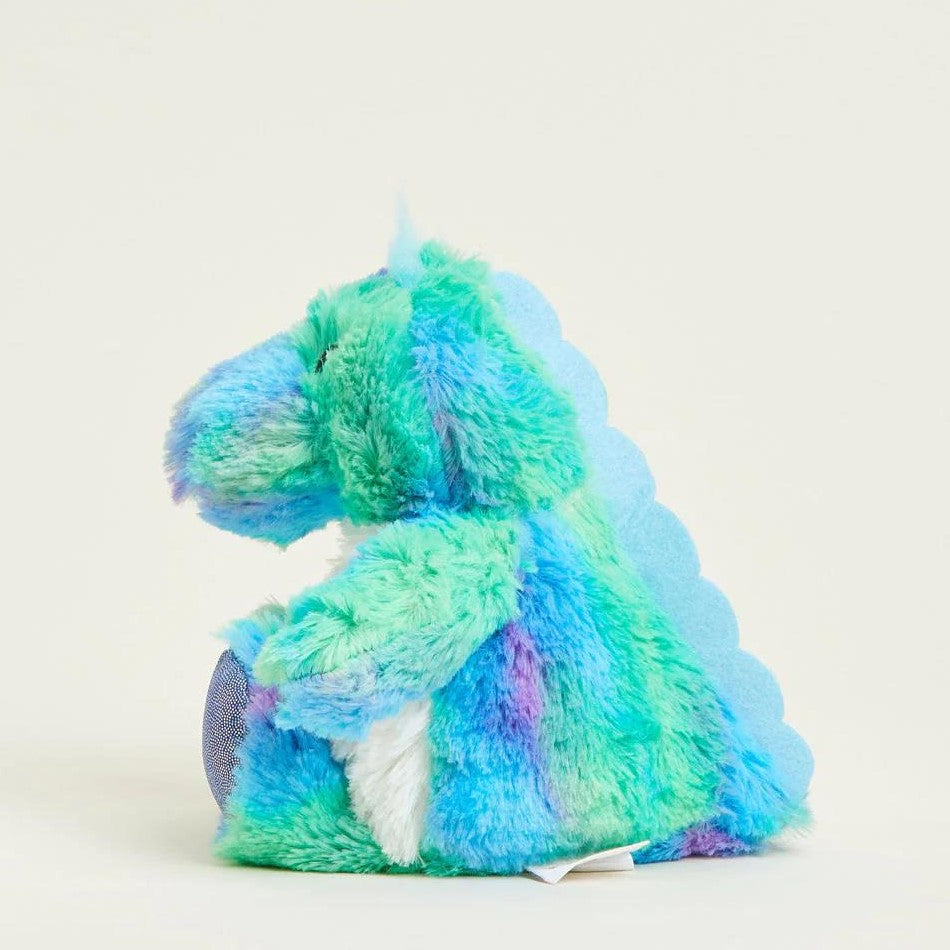 Colorful plush dinosaur on a light background.