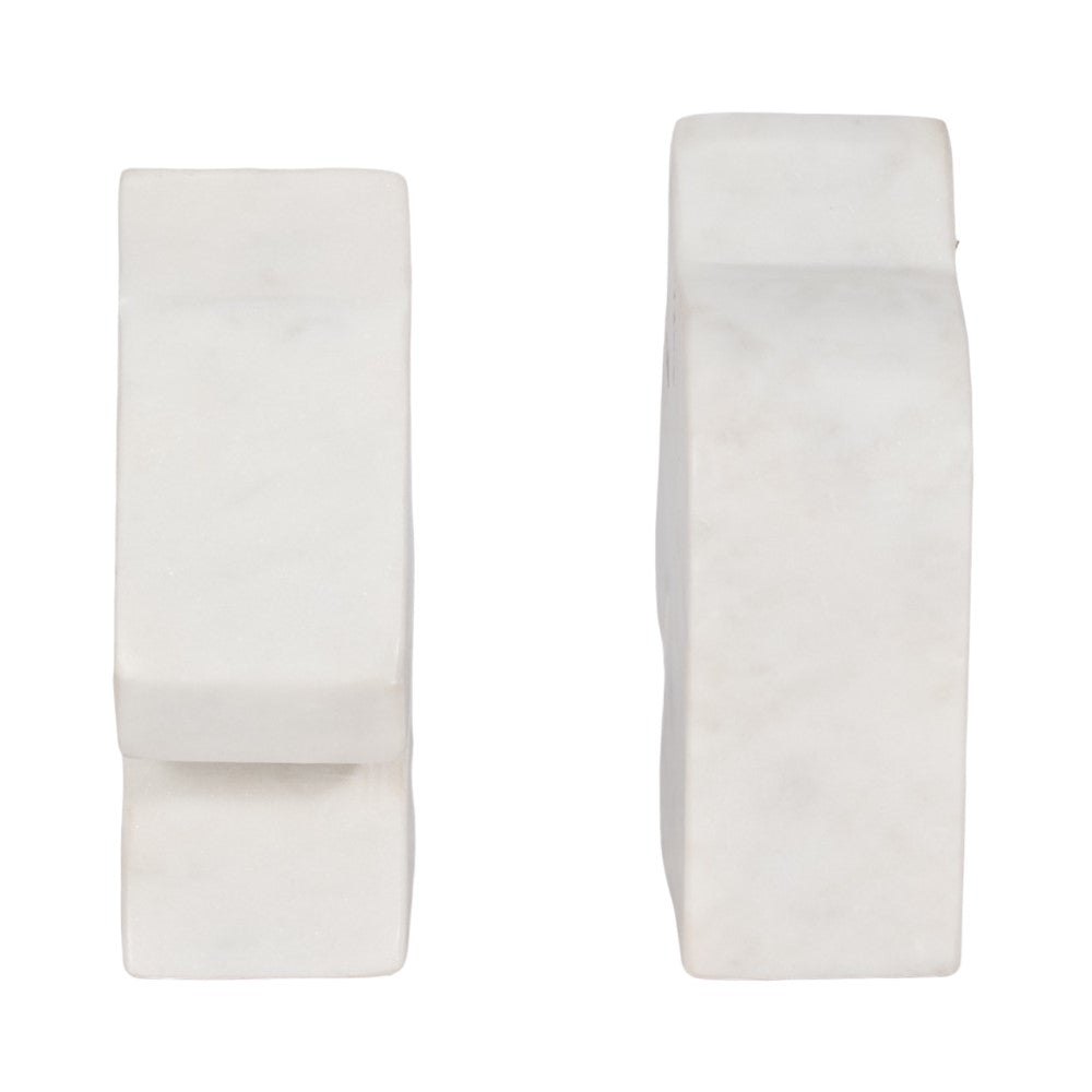 Two white rectangular marble bookends side by side.