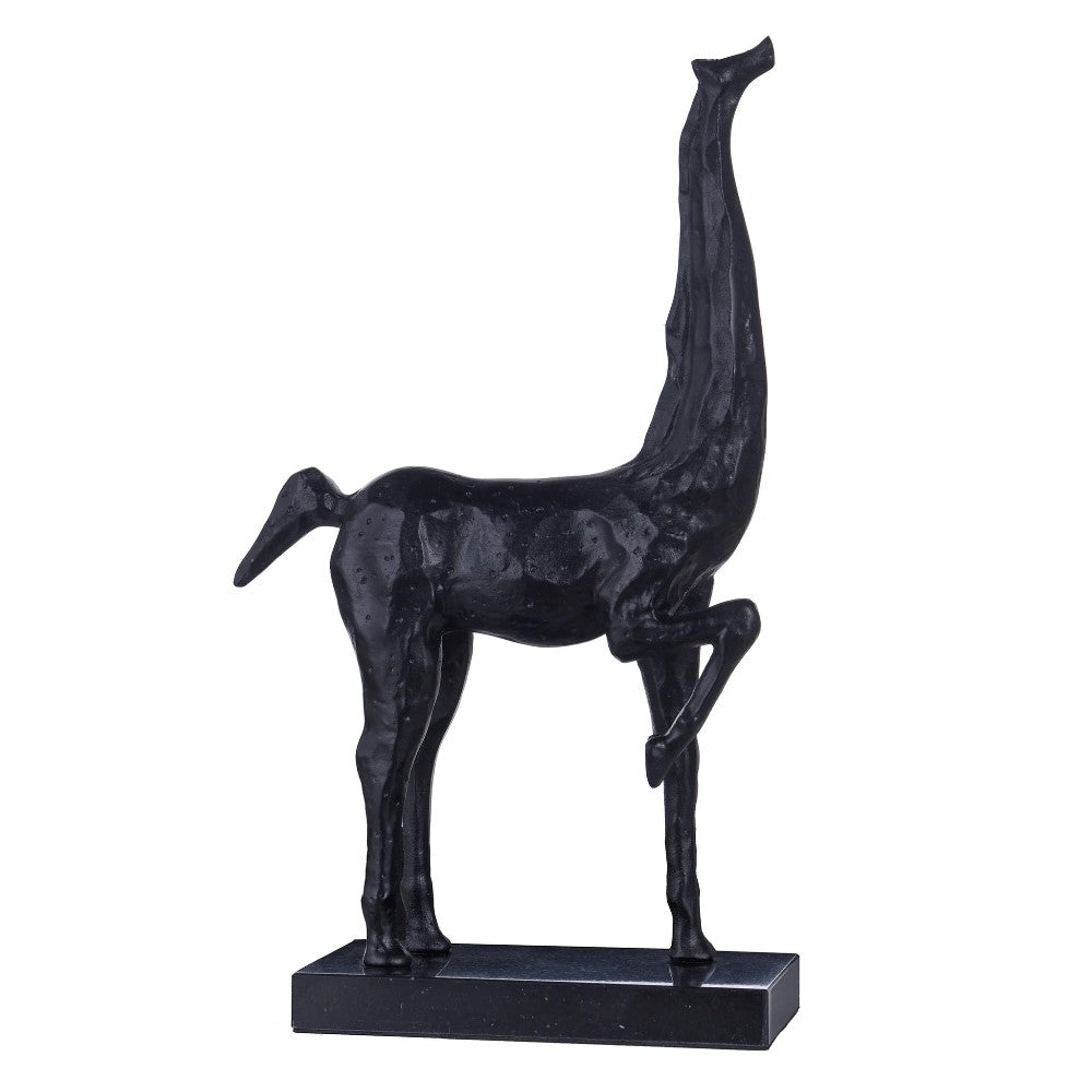 Abstract black giraffe sculpture on a rectangular base.