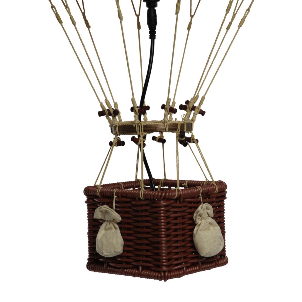 Mini wicker hot air balloon with attached ropes and sandbags.