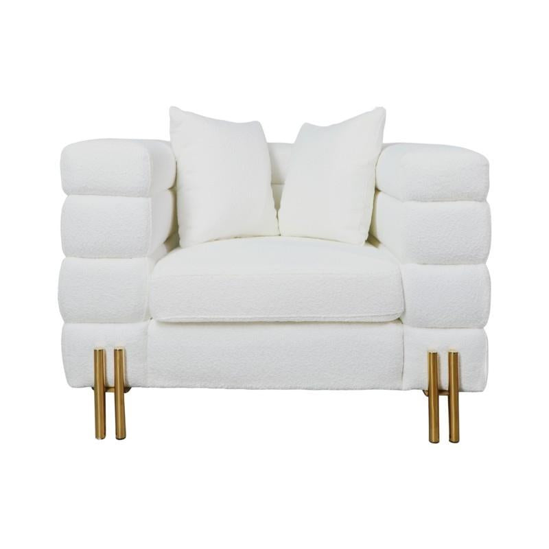 White cushioned armchair with a modern design and gold legs.