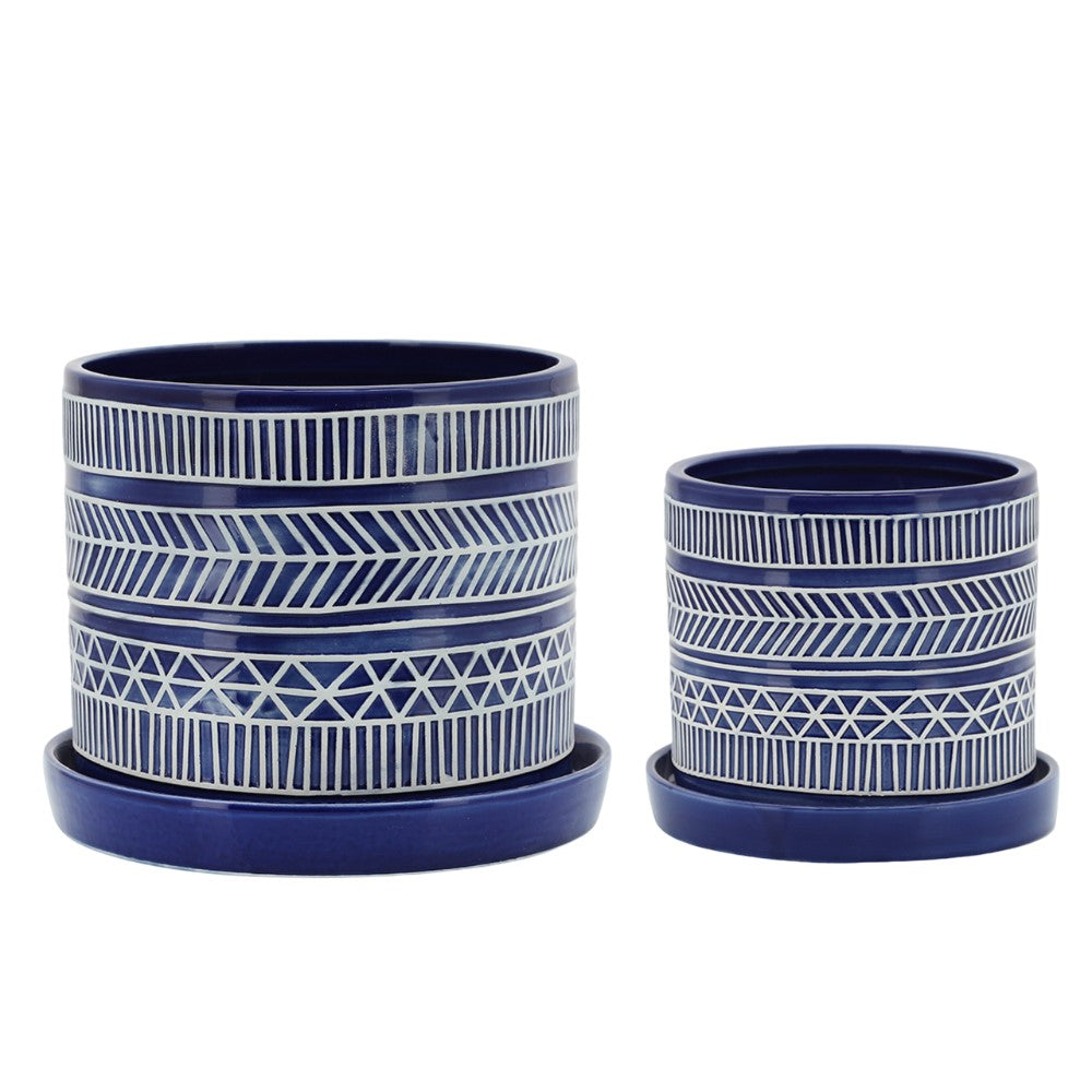 Two blue pots with white geometric patterns.