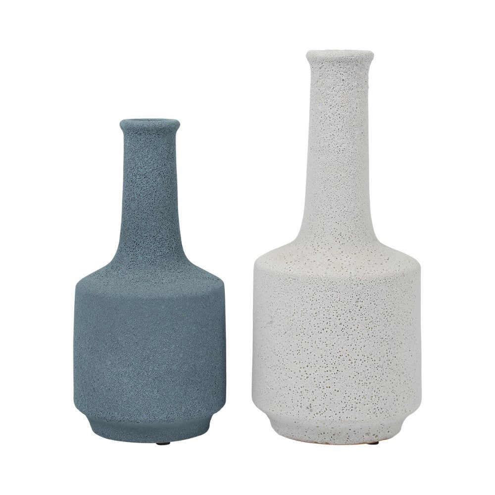 Two textured vases, one blue and one white, side by side.
