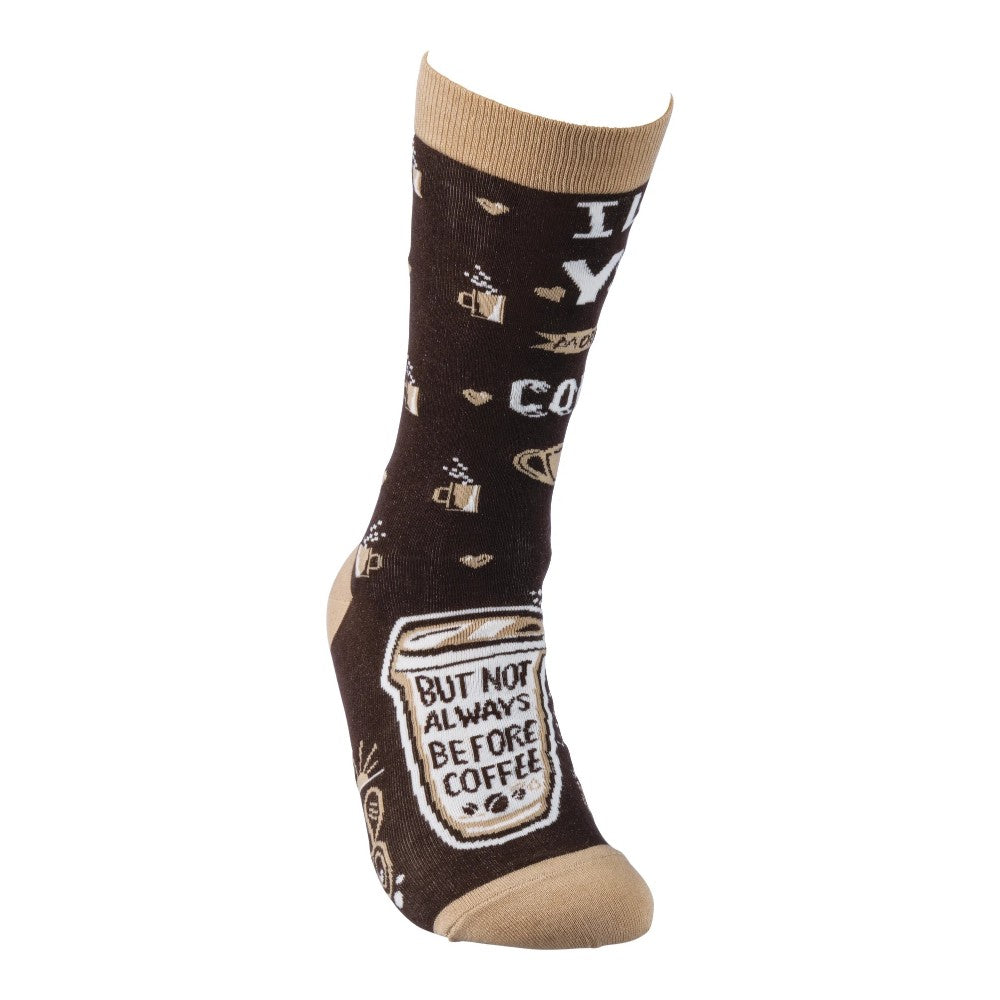 Brown sock with coffee-themed designs and text.