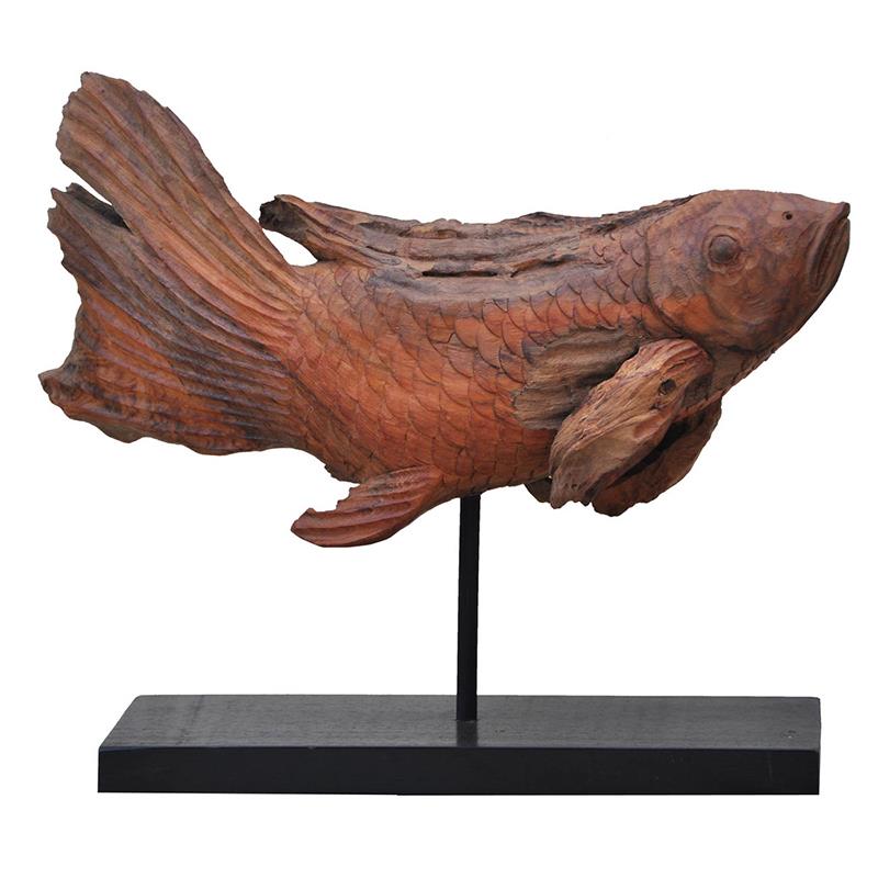 Wooden fish sculpture on a black stand.