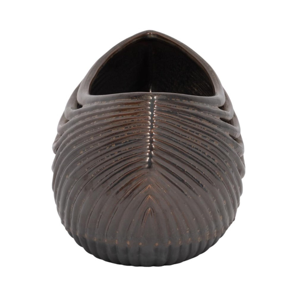 Dark, ribbed shoe with a pointed front, viewed from above.