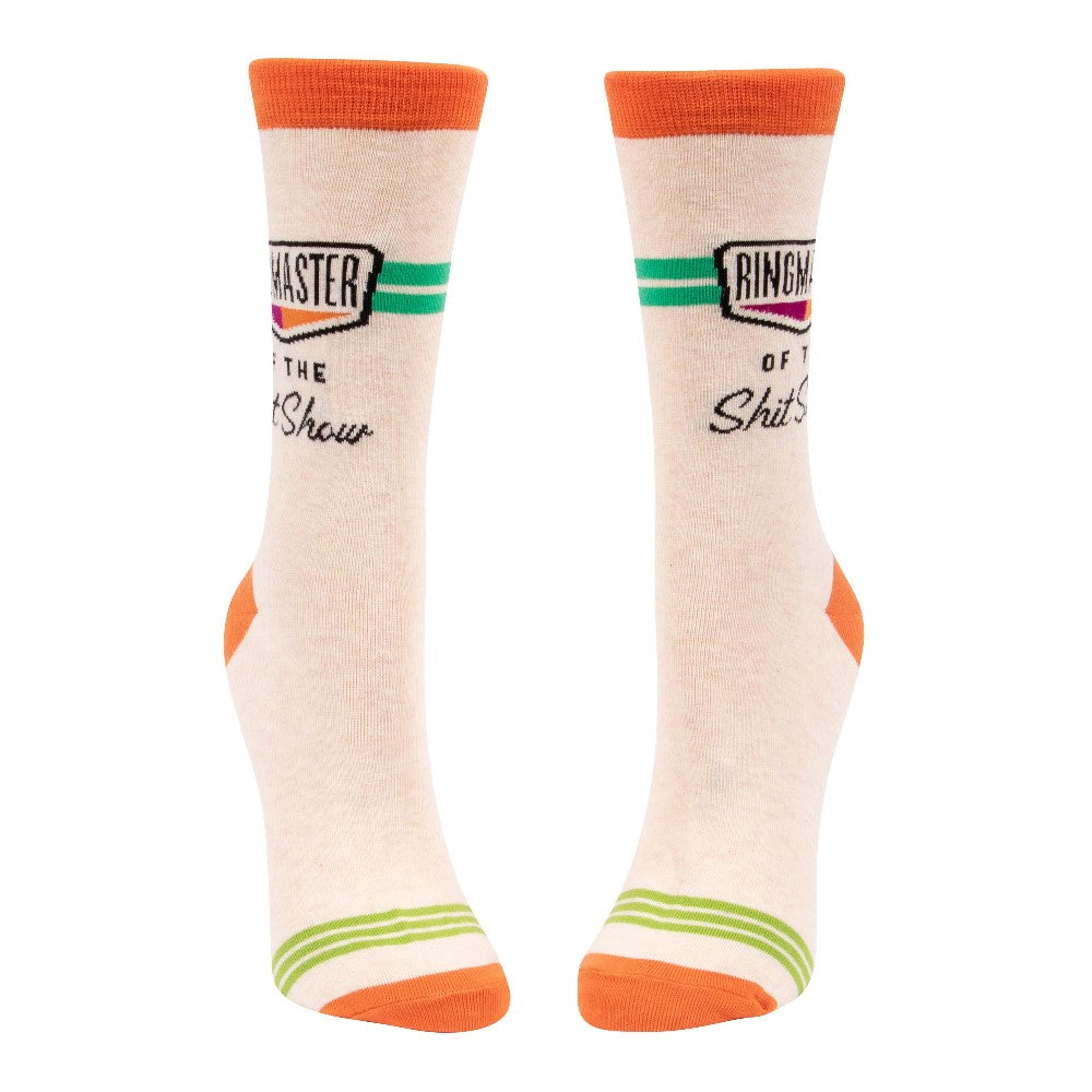 Cream socks with orange trim, green stripe, humorous text design.