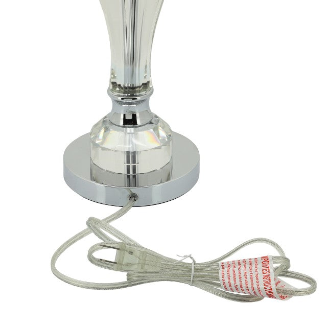 Metallic lamp base with a cord and safety tag attached.