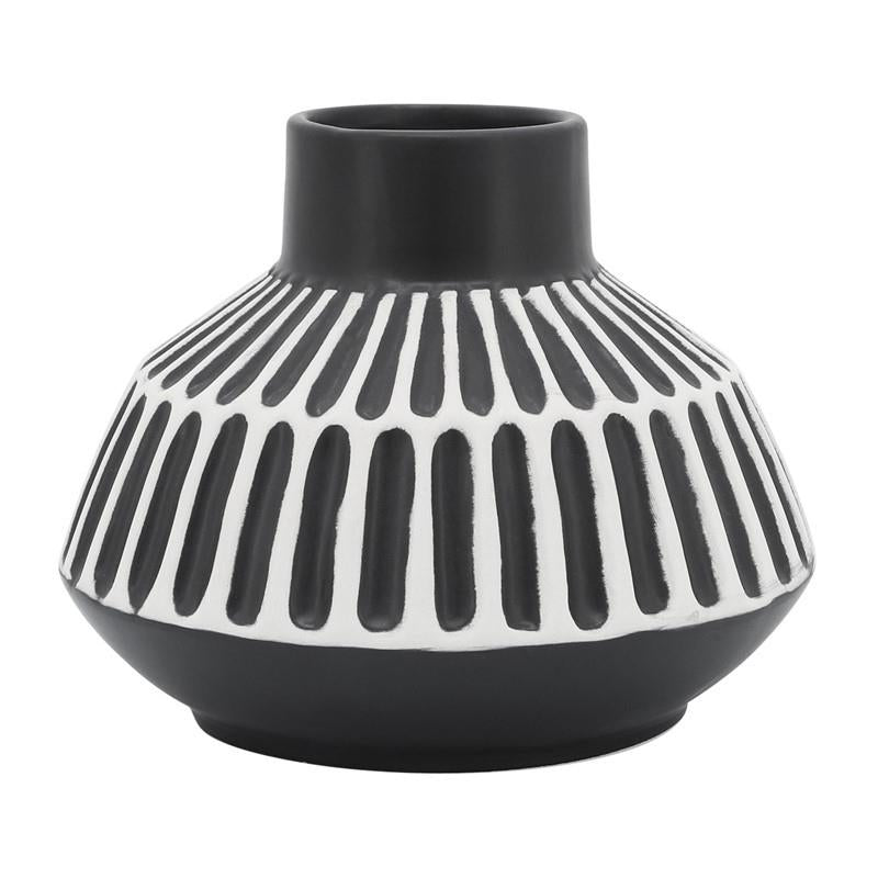 Black and white vase with vertical striped pattern.