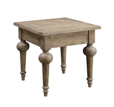 Rustic wooden table with ornate, turned legs.