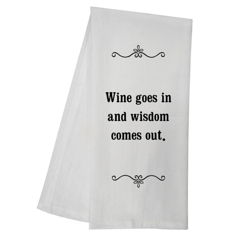 White towel with the text: "Wine goes in and wisdom comes out."