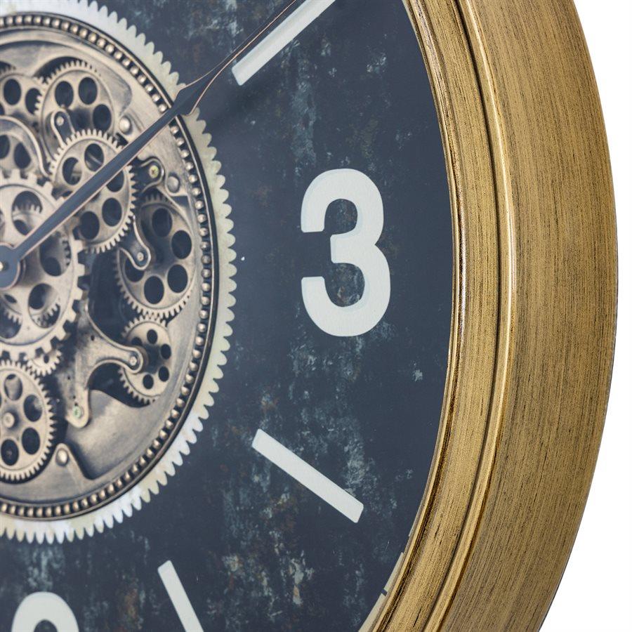 Close-up of a clock face with gears, showing the number 3.