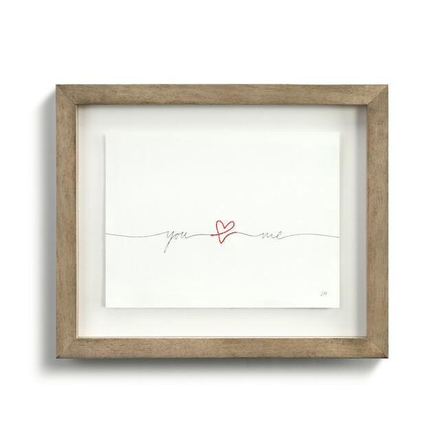 Framed art with "you ?? me" in elegant handwriting.