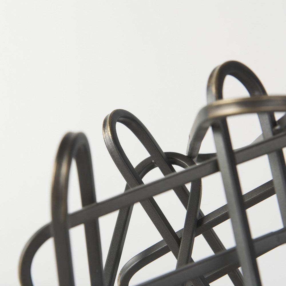 Close-up of overlapping black metal bars.