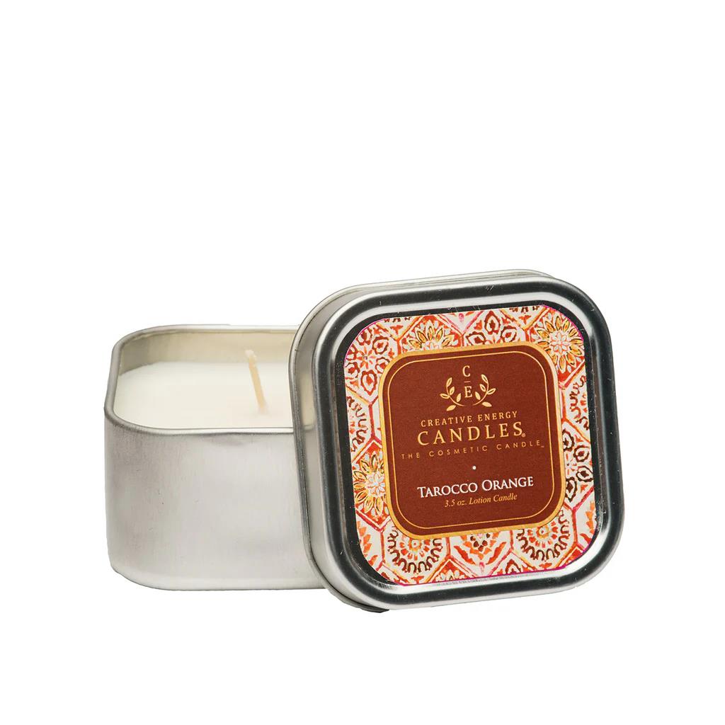 Small silver tin with a Tarocco Orange scented candle inside.