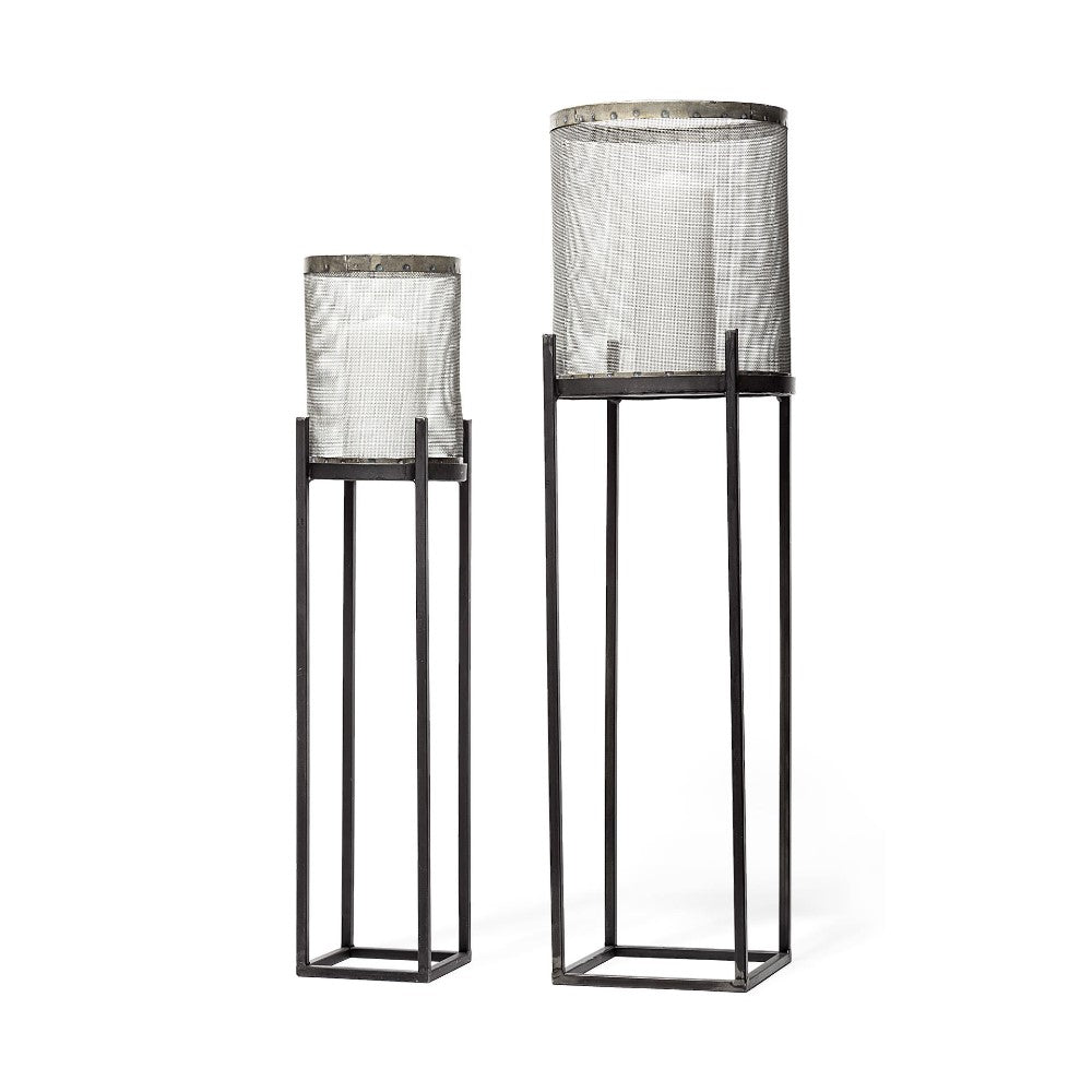 Two mesh baskets on tall black metal stands.
