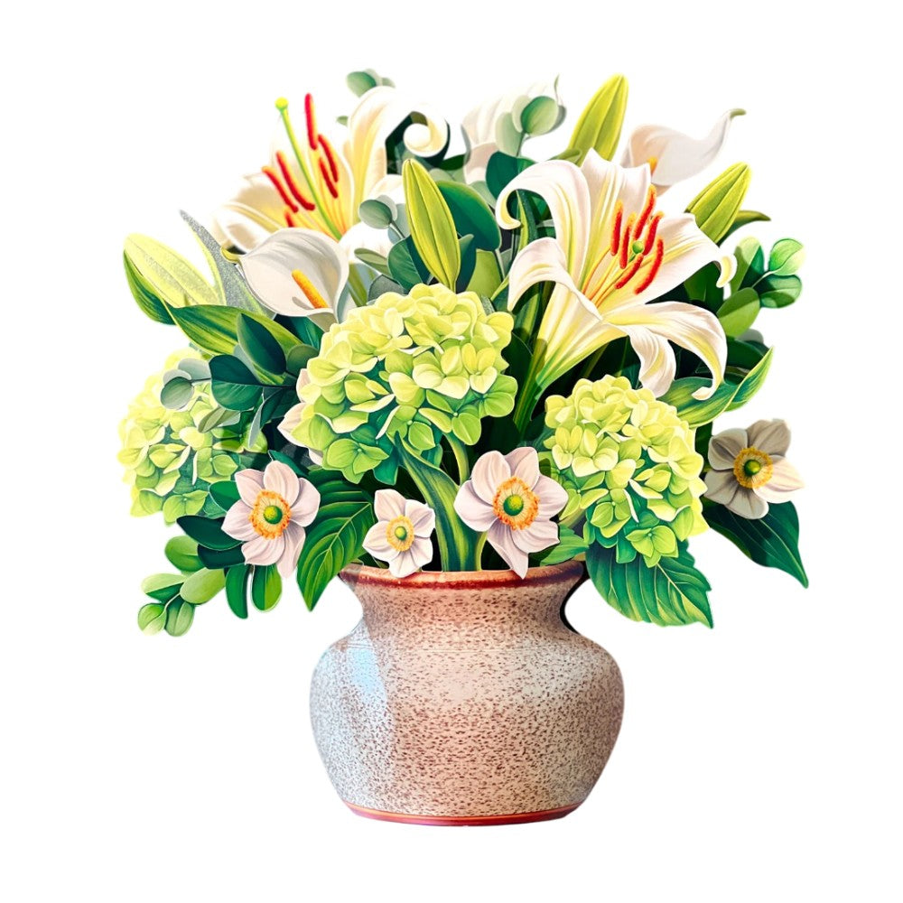 Vibrant floral bouquet in a speckled vase.