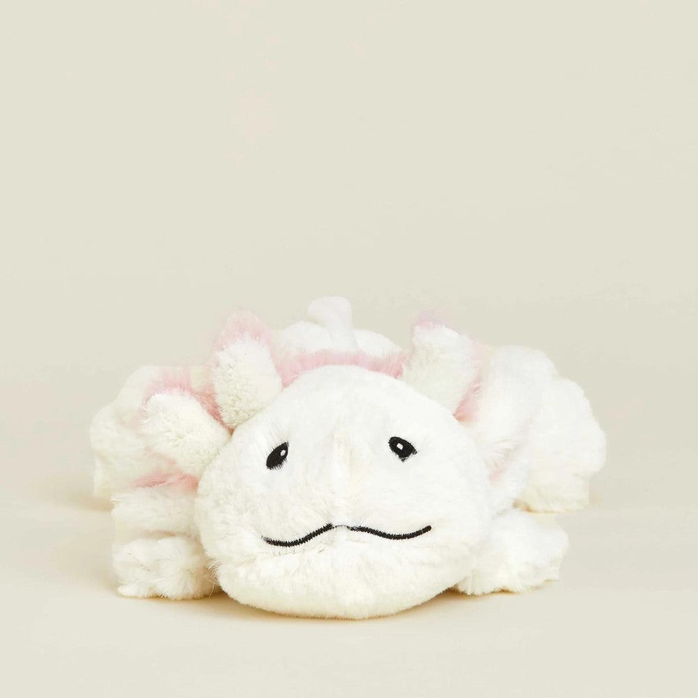 Cute white plush toy with a simple smiling face.