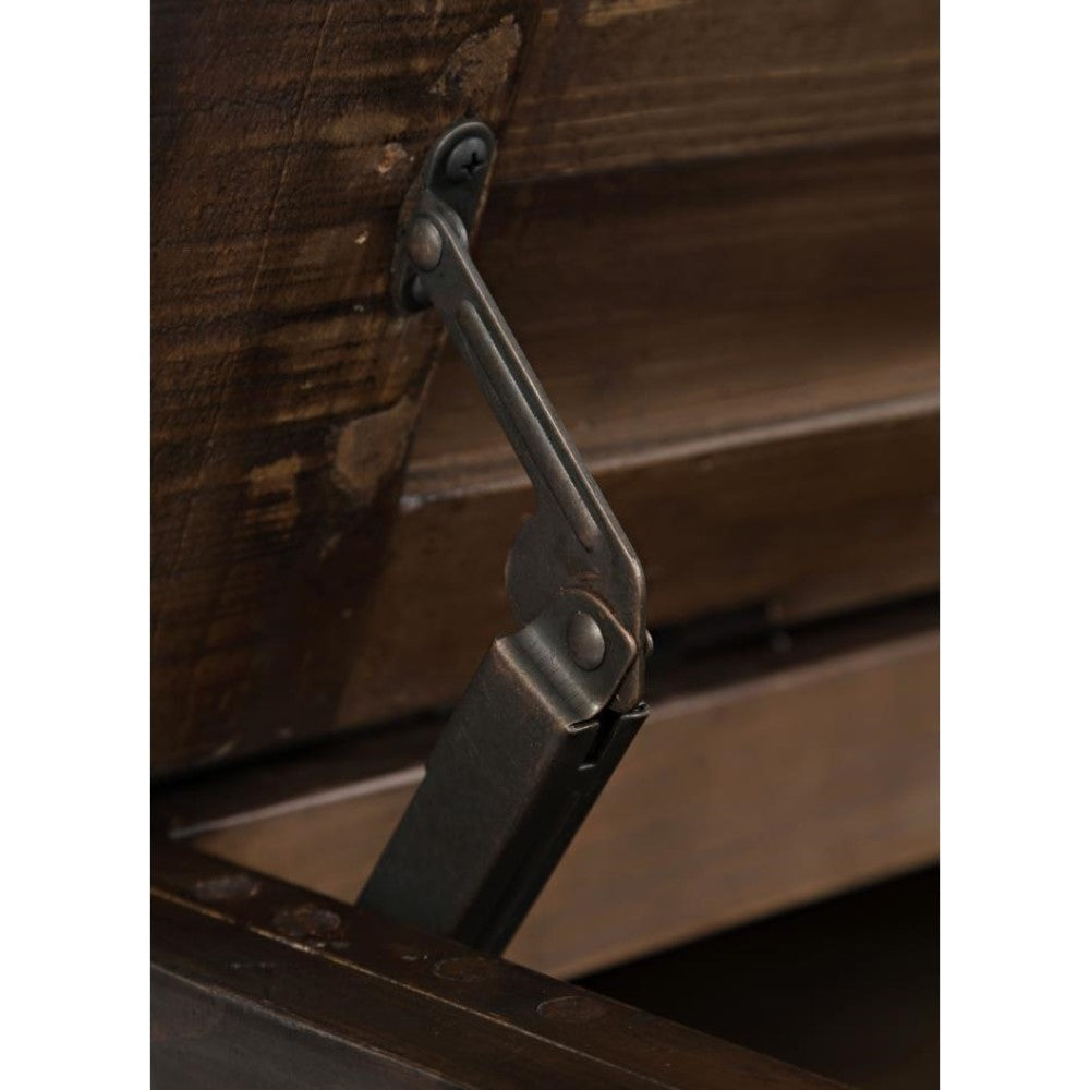 Metal hinge on wooden furniture lid.