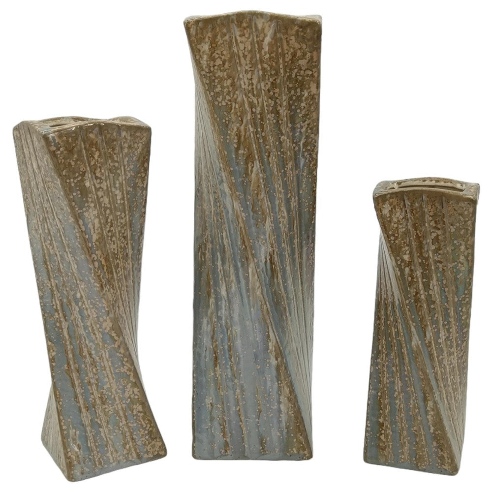 Three textured, twisted vases with a speckled finish in tones of brown and gray.