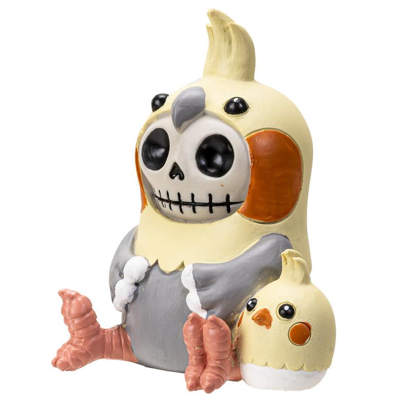 Cute cockatiel figures with a skull face design sit together.