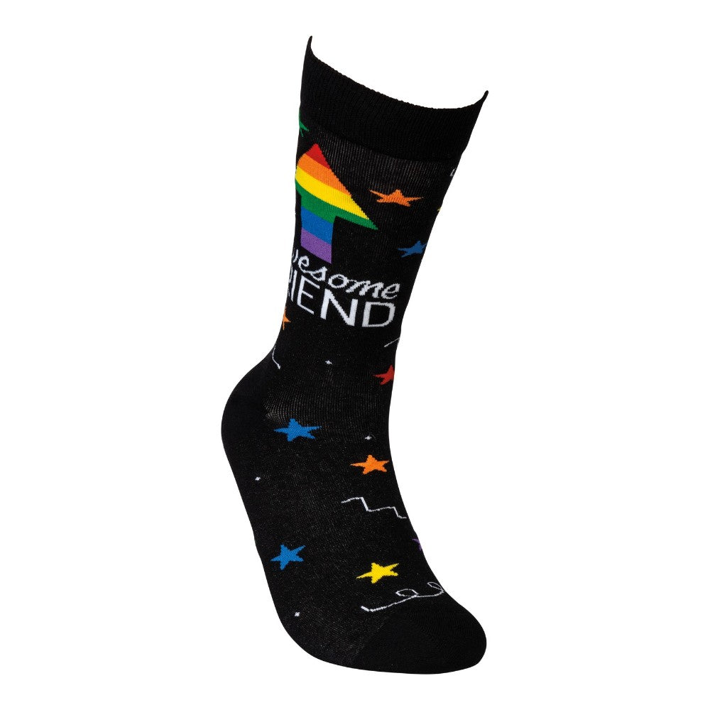 Black sock with rainbow text and colorful stars design.