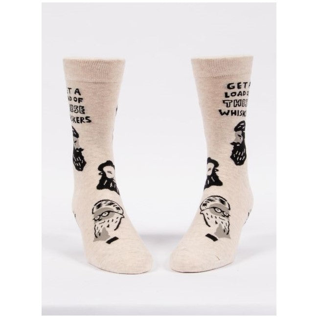 Beige socks with bearded faces and "Get a load of these whiskers" text.