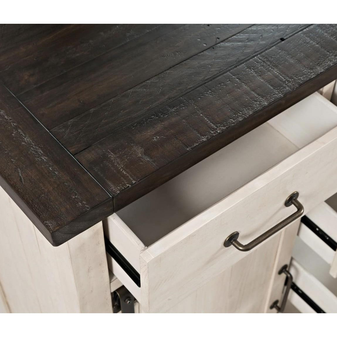 Wooden cabinet with dark top, open drawers, metal handles.