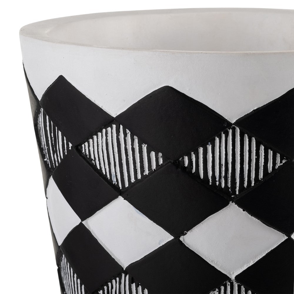 Black and white checkered pattern on a cylindrical surface.
