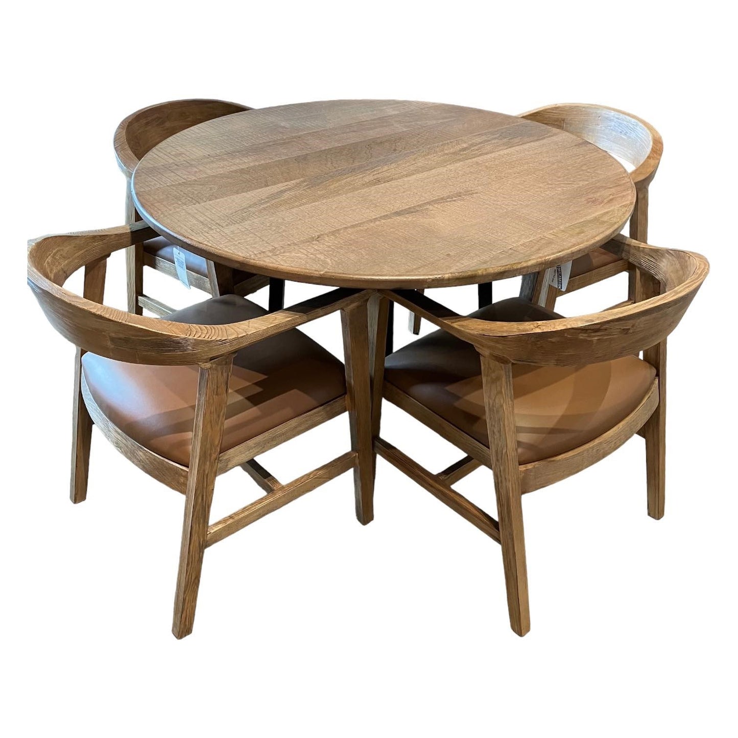 Round wooden table with four matching chairs.