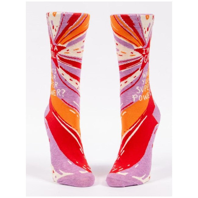 Colorful socks with empowering message: "I'm a girl. What's your super power?"