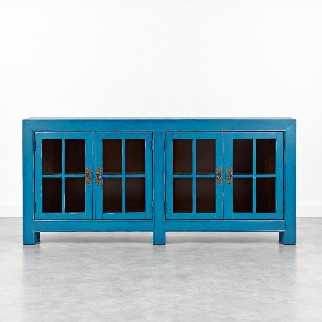 Blue wooden cabinet with open glass doors.