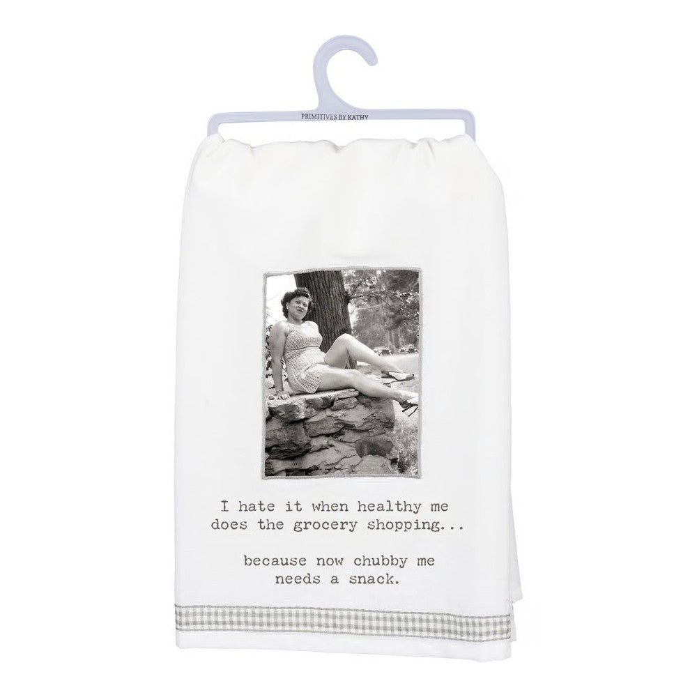 Towel with a vintage photo and humorous text about grocery shopping and snacking.