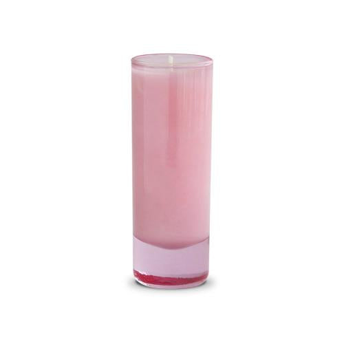 Tall pink pillar candle in a clear glass holder.