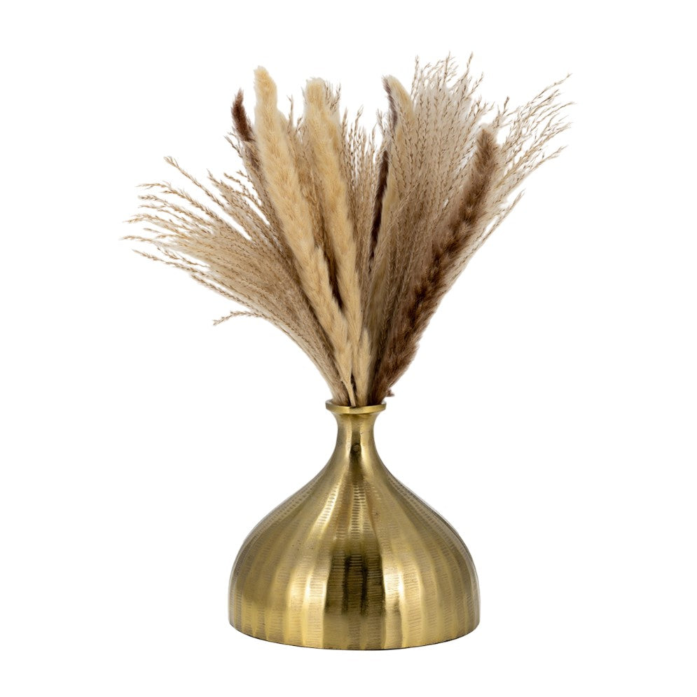Golden vase with pampas grass against a white background.