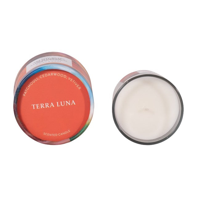 Red Terra Luna scented candle with patchouli, cedarwood, vetiver.