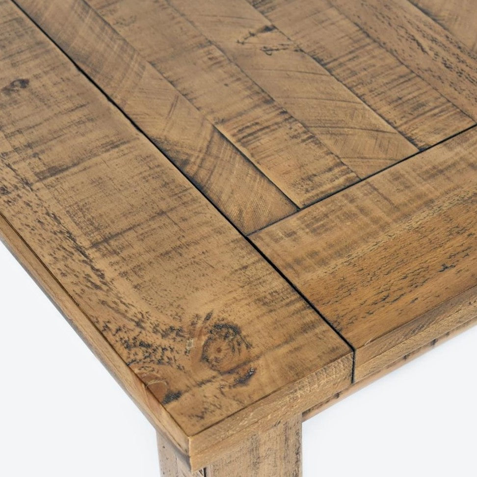 Rustic wooden table corner with a natural finish.
