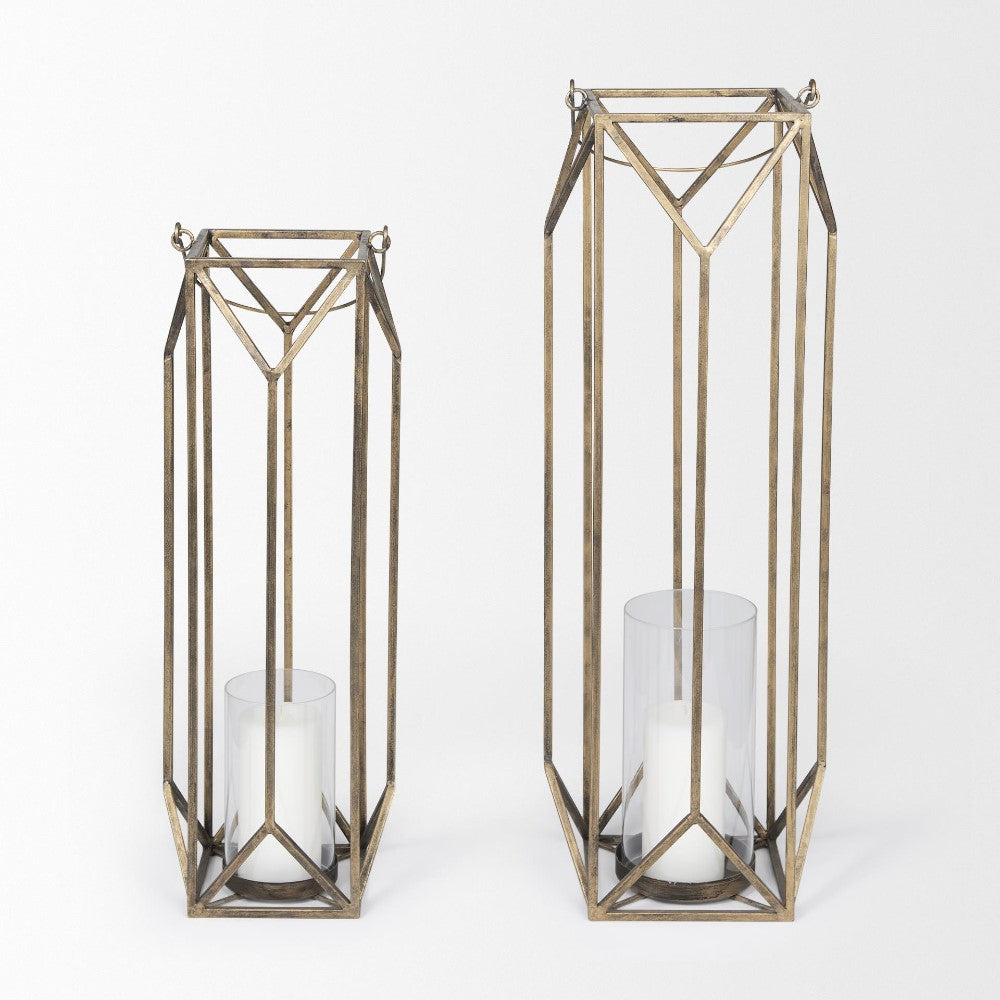 Tall, geometric metal lanterns with candles inside.