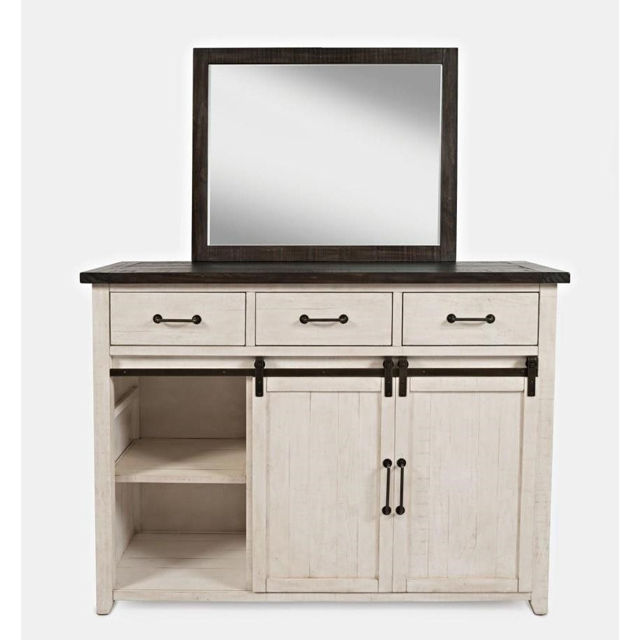White dresser with mirror, three drawers, and sliding doors.