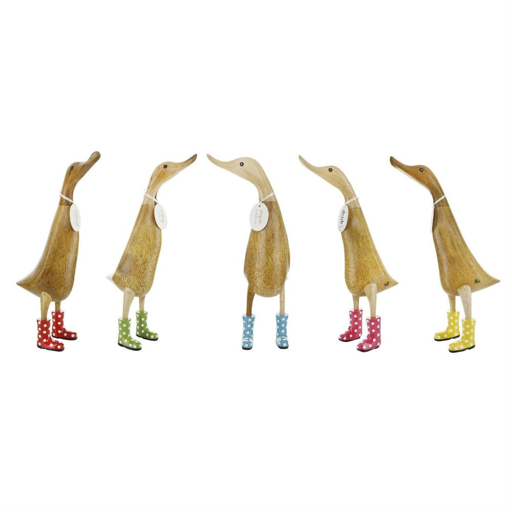 Five carved ducks wearing colorful polka-dot boots.