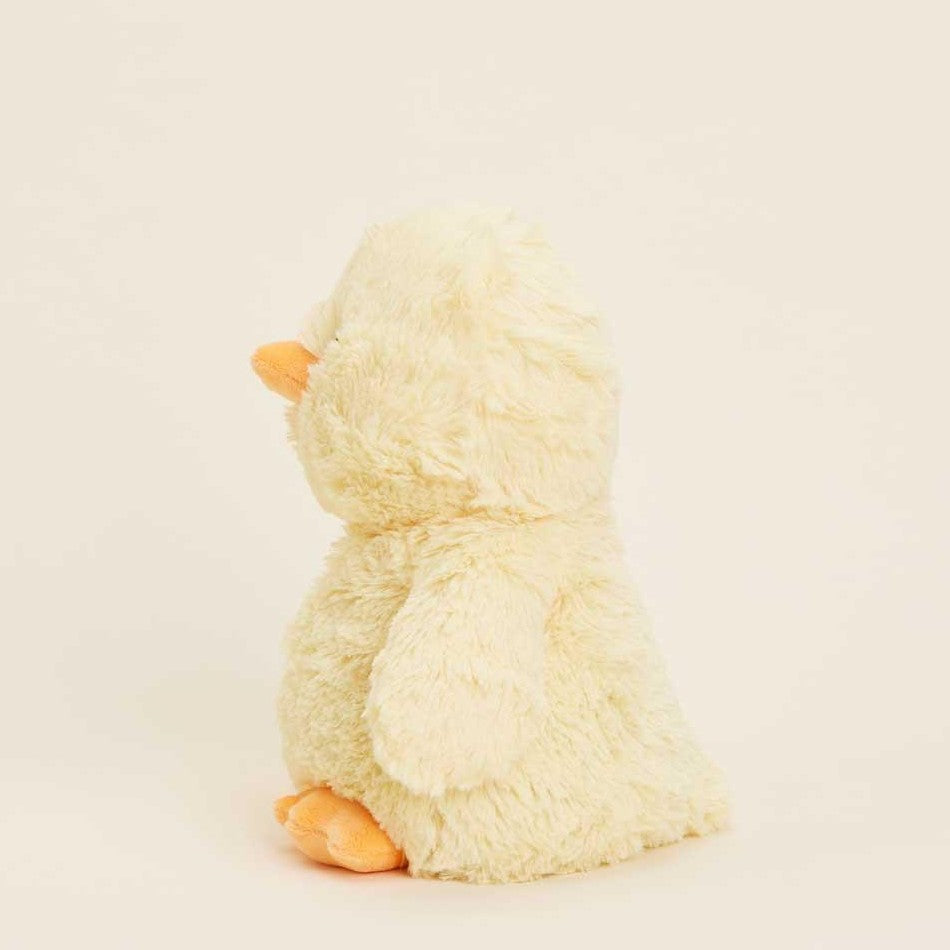 Fluffy yellow duck plush toy facing left.