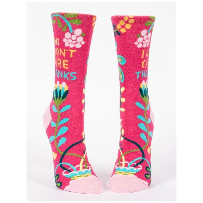 Colorful socks with floral patterns and cheeky text.