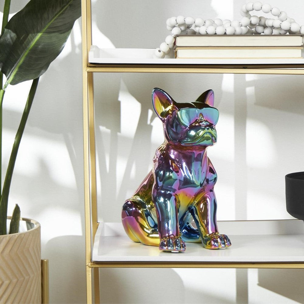 Metallic rainbow bulldog statue wearing sunglasses on a shelf.