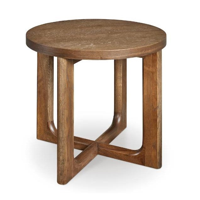 Round wooden side table with a simple modern design.