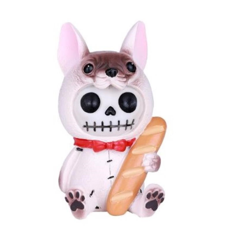 Skeleton dog figure with a red bow tie, holding a loaf of bread.