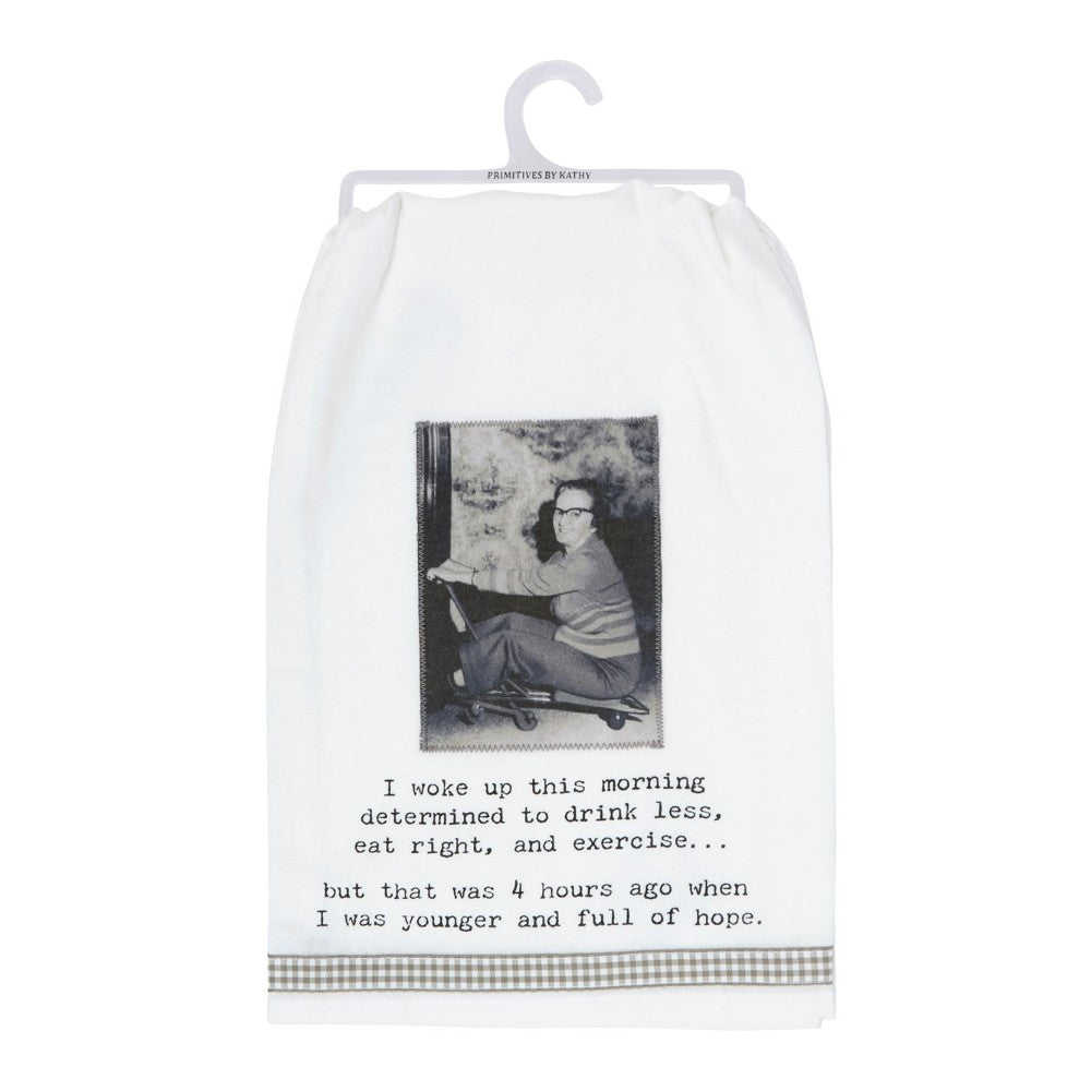 Towel with a humorous vintage photo and printed quote about giving up on resolutions.